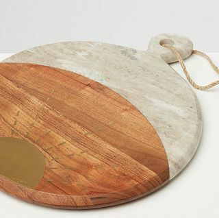 لوح تقديم دائري من الرخام والخشب سول